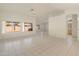 Spacious living area with tile floors and access to backyard at 8737 W Kimberly Way, Peoria, AZ 85382
