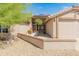 House exterior with a two car garage and walkway at 8737 W Kimberly Way, Peoria, AZ 85382
