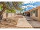 Large backyard with gravel and a covered patio area at 8737 W Kimberly Way, Peoria, AZ 85382