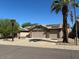 Single-story home with a two-car garage and desert landscaping at 8737 W Kimberly Way, Peoria, AZ 85382