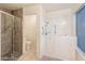 Bathroom with walk-in shower and accessible bathtub at 8737 W Kimberly Way, Peoria, AZ 85382