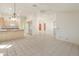 Kitchen with island and beige cabinets at 8737 W Kimberly Way, Peoria, AZ 85382