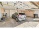 Attached garage with overhead storage and room for one vehicle at 8737 W Kimberly Way, Peoria, AZ 85382