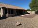Spacious backyard with gravel and covered patio at 8737 W Kimberly Way, Peoria, AZ 85382