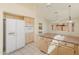 Beige kitchen with island and appliances at 8737 W Kimberly Way, Peoria, AZ 85382