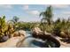 Relaxing hot tub with mountain views and desert landscaping at 8300 E Dixileta Dr # 263, Scottsdale, AZ 85266