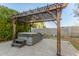 Hot tub situated under a wooden pergola at 1549 E Turquoise Ave, Phoenix, AZ 85020