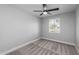 Well-lit bedroom with neutral walls and carpet flooring at 801 E Echo Ln, Phoenix, AZ 85020