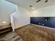 Spacious living room with carpeted floor and neutral color scheme at 10816 W Melvin St, Avondale, AZ 85323