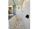 Modern bathroom with a large walk-in shower and hexagon tile floor at 10816 W Melvin St, Avondale, AZ 85323