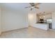 Living room with kitchen and breakfast bar at 16013 S Desert Foothills Pkwy # 1150, Phoenix, AZ 85048