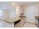 Granite countertops and stainless steel appliances in this updated kitchen at 16013 S Desert Foothills Pkwy # 1150, Phoenix, AZ 85048
