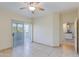 Bedroom with sliding door to patio and views of the outdoors at 16013 S Desert Foothills Pkwy # 1150, Phoenix, AZ 85048