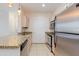 Modern kitchen with granite countertops and stainless steel appliances at 16013 S Desert Foothills Pkwy # 1150, Phoenix, AZ 85048
