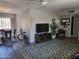 Open living space with dining area, TV, and a bicycle at 825 N Hayden Rd # C207, Scottsdale, AZ 85257