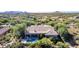 Aerial view of home with pool and expansive desert landscape in background at 8536 E Preserve Way, Scottsdale, AZ 85266