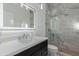 Bathroom with a marble shower and modern vanity at 8536 E Preserve Way, Scottsdale, AZ 85266