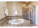 Bathroom with soaking tub and shower, tile finishes at 20750 N 87Th St # 2131, Scottsdale, AZ 85255