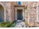 Front entry of a home with stone facade and columns at 20750 N 87Th St # 2131, Scottsdale, AZ 85255