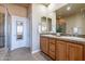 Double vanity bathroom with tiled shower and flooring at 20750 N 87Th St # 2131, Scottsdale, AZ 85255