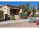 Townhome exterior showcasing landscaping and walkway at 846 N Pueblo Dr # 110, Casa Grande, AZ 85122