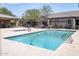 Inviting community pool with a spa and ample seating at 846 N Pueblo Dr # 110, Casa Grande, AZ 85122