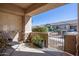 Spacious covered patio with wrought iron gate and view of community at 846 N Pueblo Dr # 110, Casa Grande, AZ 85122