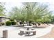 Community courtyard with a stone table and chairs at 846 N Pueblo Dr # 110, Casa Grande, AZ 85122