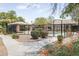 Community pool with a covered patio and lounge chairs at 846 N Pueblo Dr # 110, Casa Grande, AZ 85122