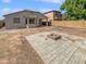 Backyard with a fire pit and a paved patio area at 8021 S 48Th Ln, Laveen, AZ 85339