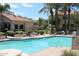 Inviting community pool with a surrounding patio at 3830 E Lakewood E Pkwy # 2105, Phoenix, AZ 85048