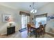 Cozy dining area with a wooden table and six chairs at 2101 S Meridian Rd # 126, Apache Junction, AZ 85120