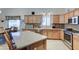 Kitchen boasts granite countertops and wooden cabinets at 2101 S Meridian Rd # 126, Apache Junction, AZ 85120