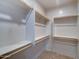 Large walk-in closet with double hanging rods and shelving at 2101 S Meridian Rd # 126, Apache Junction, AZ 85120