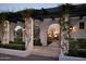 Outdoor pergola with lighting and lush vines at 7835 N Ironwood Dr, Paradise Valley, AZ 85253