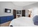 Spacious bedroom with ample closet space and a view of the backyard at 38169 N Rusty Ln, San Tan Valley, AZ 85140