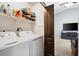 Convenient laundry room with washer, dryer, and storage at 38169 N Rusty Ln, San Tan Valley, AZ 85140