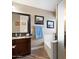 Relaxing bathroom with soaking tub and granite countertop at 38169 N Rusty Ln, San Tan Valley, AZ 85140