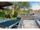 Outdoor kitchen and dining area with mountain views at 10801 E Happy Valley Rd # 132, Scottsdale, AZ 85255