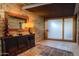 Elegant entryway with stone walls, unique etched glass door, and a warm, inviting atmosphere at 10801 E Happy Valley Rd # 132, Scottsdale, AZ 85255