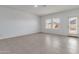 Dining area with tile flooring and access to backyard at 19373 W Coolidge St, Litchfield Park, AZ 85340