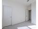 Bright bedroom with a door leading to another room at 17978 W Long Lake Rd, Goodyear, AZ 85338