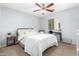 Cozy bedroom with a queen bed and built in desk at 2851 W Gold Dust Ave, San Tan Valley, AZ 85144