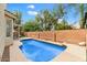Inviting rectangular pool in a private backyard setting at 9056 E Maple Dr, Scottsdale, AZ 85255