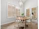 Cozy breakfast nook with a round table and access to backyard at 9056 E Maple Dr, Scottsdale, AZ 85255