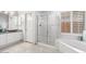 Bathroom with a shower, bathtub, and double sink vanity at 9056 E Maple Dr, Scottsdale, AZ 85255