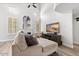 Relaxing living room with sectional sofa and fireplace at 9056 E Maple Dr, Scottsdale, AZ 85255