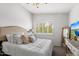 Charming bedroom with a comfortable bed and plenty of natural light at 9056 E Maple Dr, Scottsdale, AZ 85255