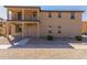 Two story home with balcony and desert landscaping at 913 E Agua Fria Ln, Avondale, AZ 85323