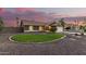 Single-story home with heart-shaped lawn and desert landscaping at 441 E Saratoga St, Gilbert, AZ 85296